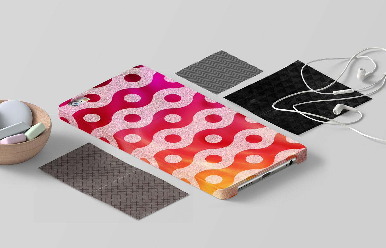 Various patterns on a phonecase, paper, and cloth